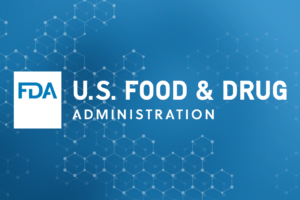 White FDA logo and the text U.S. Food & Drug Administration on a blue background with a pattern of molecular structures.