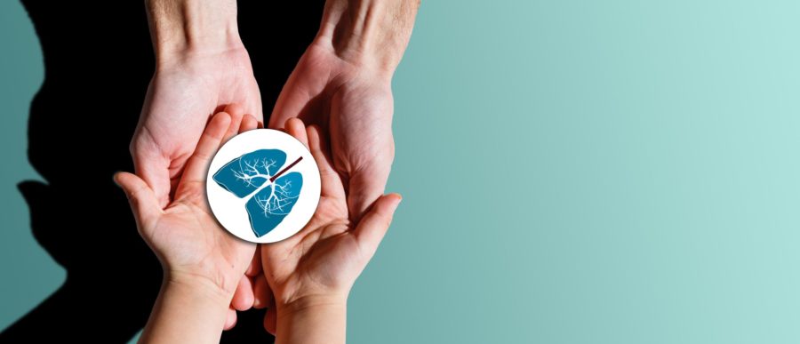 Two pairs of hands, one large and one small, gently hold a round card with a blue illustration of human lungs on a light teal background.
