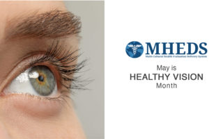 Close-up of a persons eye on the left, with the MHEDS logo and text on the right reading May is Healthy Vision Month.