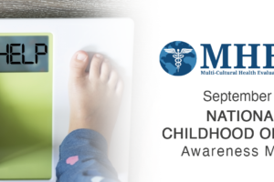 A child stands on a scale displaying the word HELP. Text beside reads: MHEDS: Multi-Cultural Health Evaluation Delivery System. September is NATIONAL CHILDHOOD OBESITY Awareness Month.