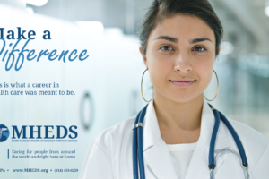 A young healthcare professional with a stethoscope smiles confidently in a medical facility. Text reads: “Make a Difference. This is what a career in health care was meant to be. MHEDS. Caring for people from around the world and right here at home.”.