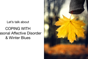 A person holding a yellow maple leaf with a blurred autumn background, next to text that reads: Lets talk about coping with Seasonal Affective Disorder & Winter Blues.
