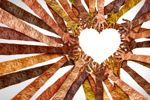 Multiple paper-textured hands of different skin tones reach towards the center, forming a heart shape in the middle, symbolizing unity, diversity, love, and community.