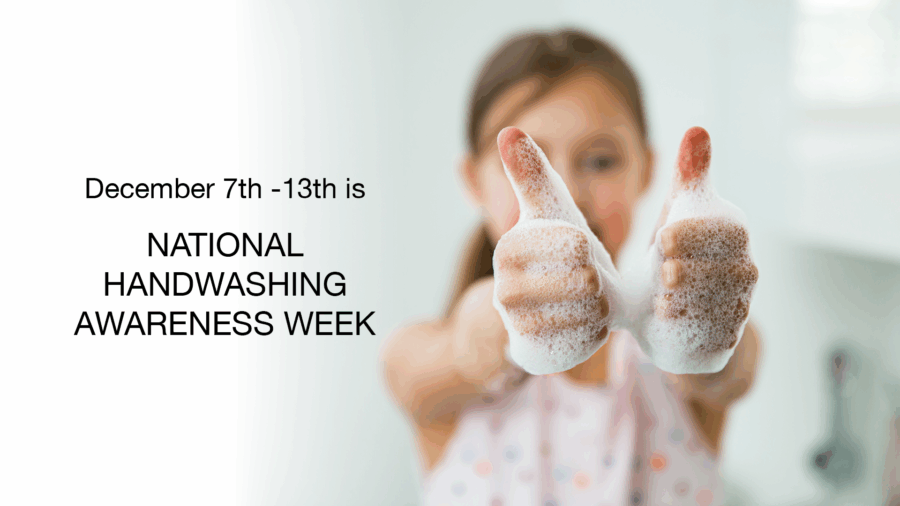 A child with soapy hands gives two thumbs up. Text beside her reads, December 7th - 13th is NATIONAL HANDWASHING AWARENESS WEEK. The background is a bright, clean room.
