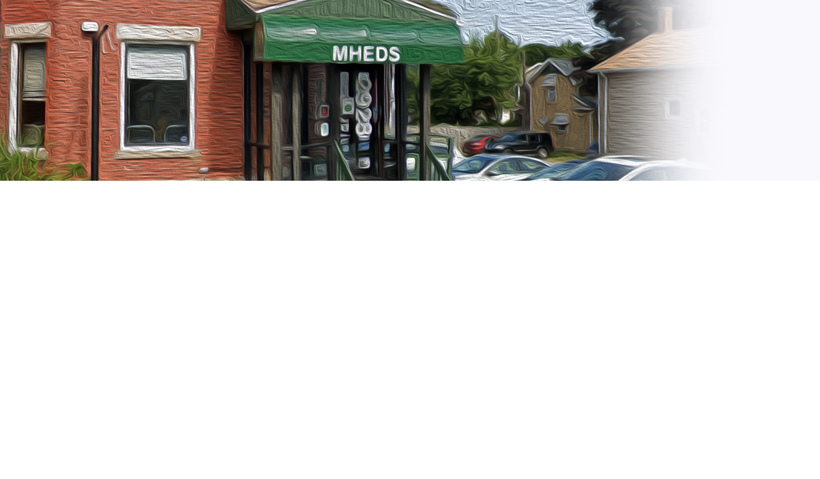 A building with red brick walls, a green awning labeled “MHEDS” above the entrance, and cars parked outside. The image is partially faded or blurred on the right and bottom sides.