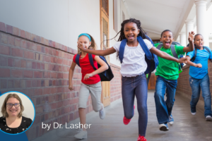 Four children with backpacks run excitedly down a covered outdoor walkway, embodying the energy of back-to-school health. An inset circle shows Mary Lasher smiling at the camera in front of a plain background.