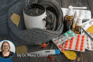 A mug of tea, scarf, cold medicine blister packs, nasal sprays, thermometer, and autumn leaves on a wooden table evoke cozy self-care during chilly days. Inset photo of Dr. Mary Lasher in a circle at bottom left highlights the importance of healthy aging and fall prevention as the seasons change.