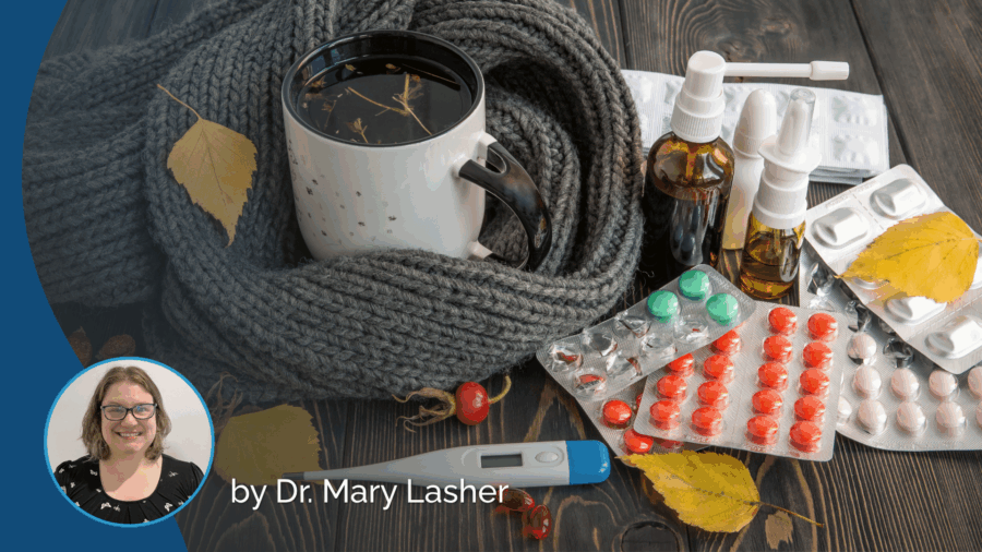 A mug of tea, scarf, cold medicine blister packs, nasal sprays, thermometer, and autumn leaves on a wooden table evoke cozy self-care during chilly days. Inset photo of Dr. Mary Lasher in a circle at bottom left highlights the importance of healthy aging and fall prevention as the seasons change.